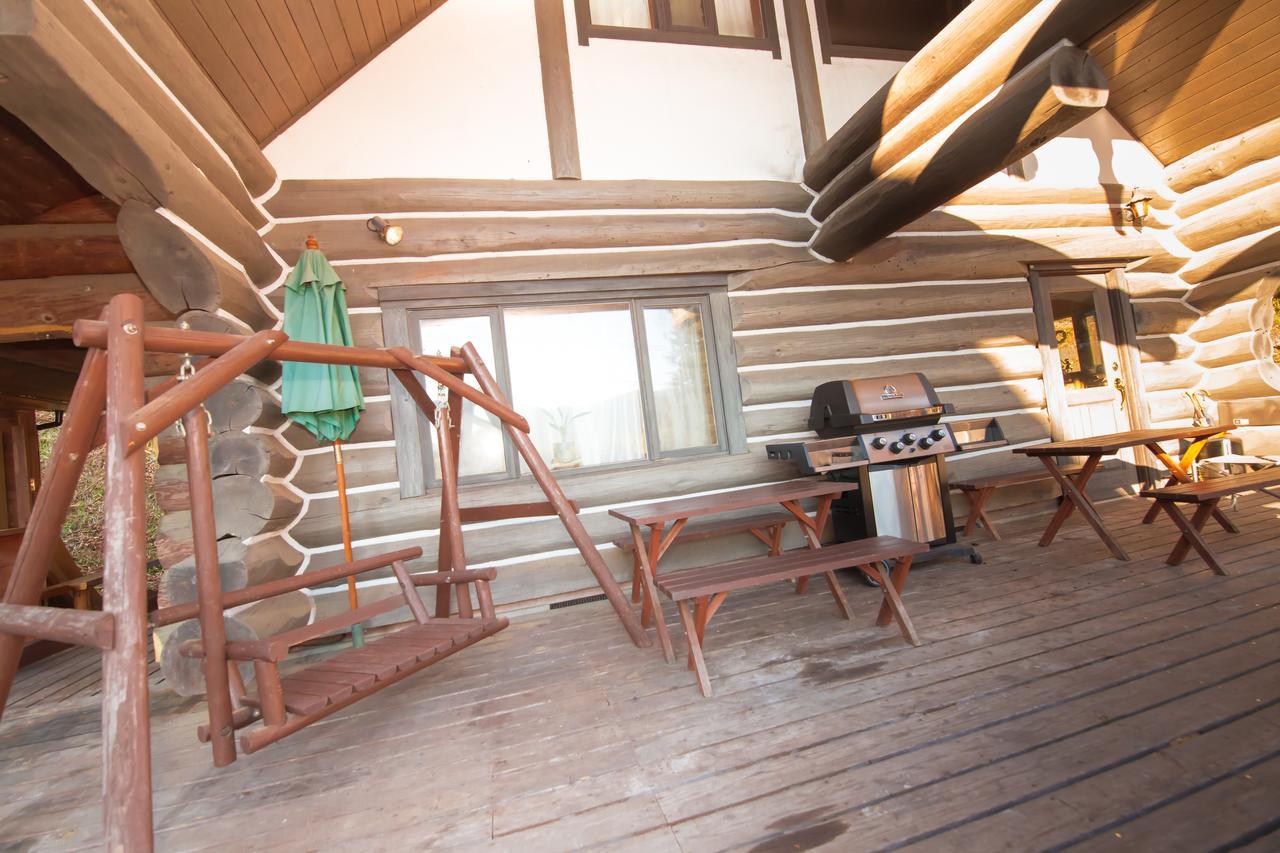 Готель Yufuin Log House No Yado Tom Sawyer Екстер'єр фото