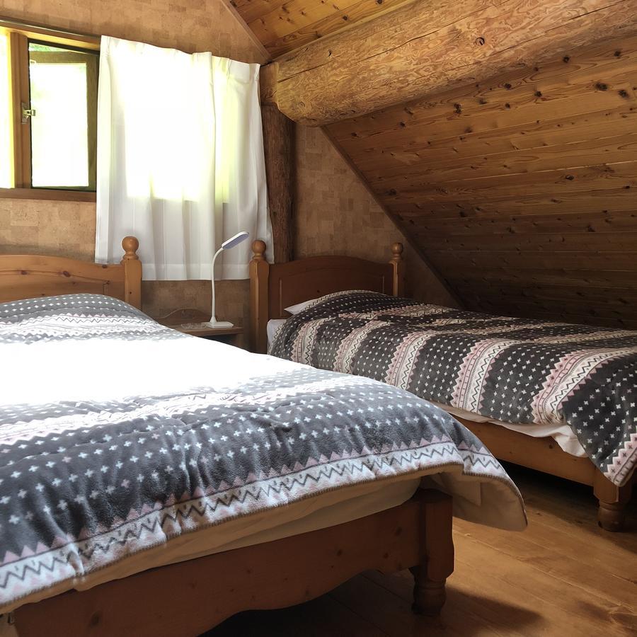 Готель Yufuin Log House No Yado Tom Sawyer Екстер'єр фото